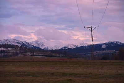 Scenic view of mountains against sky during winter