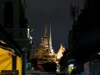 Low angle view of illuminated buildings at night