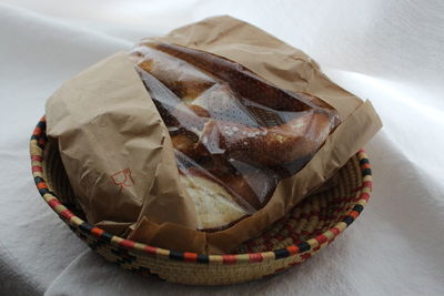 High angle view of cake in basket on table