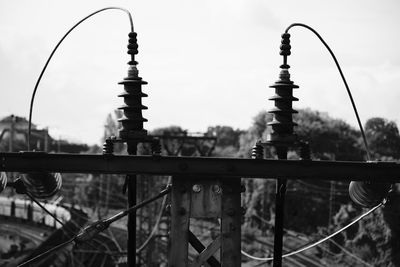 Street lights against sky