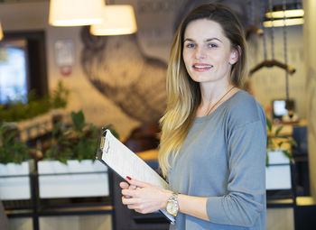 Portrait of smiling young woman