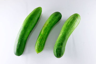 Close-up of green pepper against white background