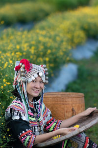 Young woman holding flower