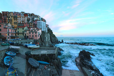 Panoramic view of beach and buildings against sky