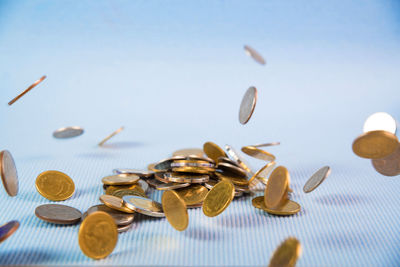 Close-up of coins on table