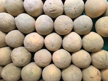 Full frame shot of honeydew melons at market for sale