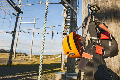 Close up of climbing gear at high rope obstacle course