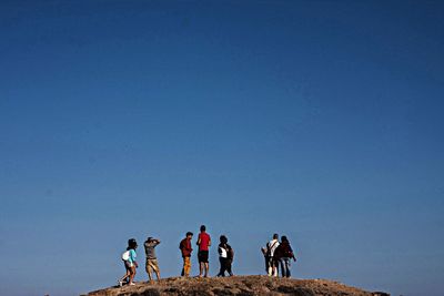 Silhouette of man against clear blue sky