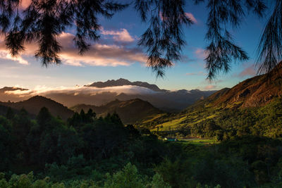 Scenic view of mountains against sky during sunset