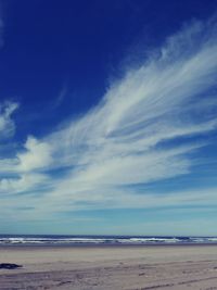 Scenic view of sea against blue sky