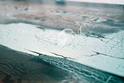 Close-up of heart shape drawn on glass