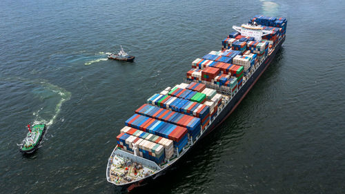 Aerial view container ship cargo freight shipping maritime vessel, global business supply chain.