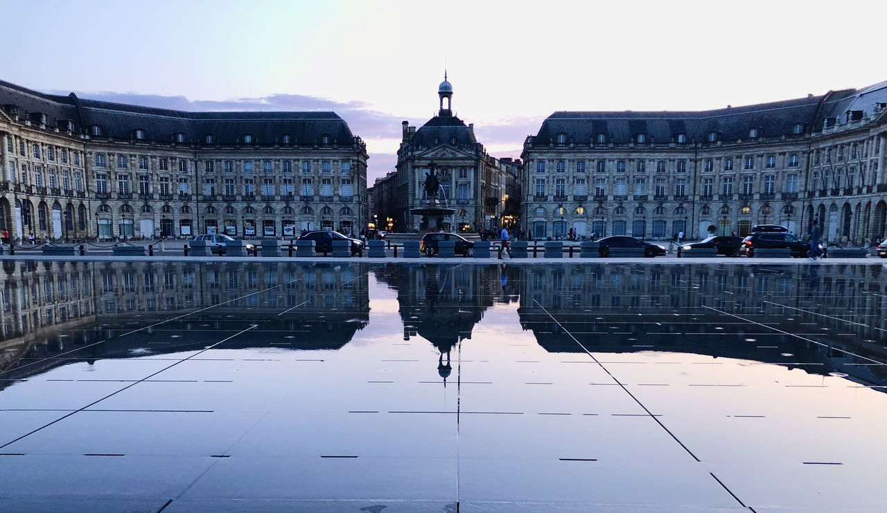 REFLECTION OF BUILDINGS ON WATER