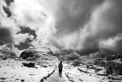 First snow on dolomites, walking on altopiano della rosetta