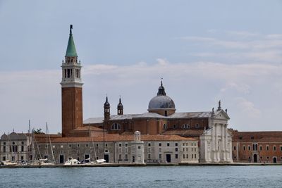 View of buildings against sky in city