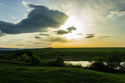 Scenic view of sea against cloudy sky