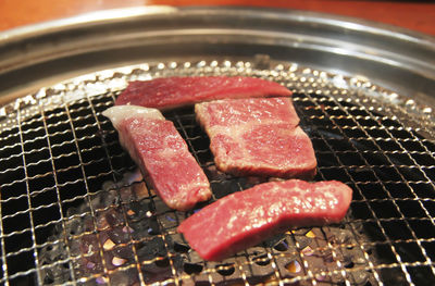 Close-up of meat in container