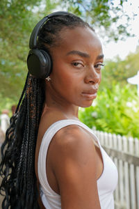 Portrait of young woman looking away