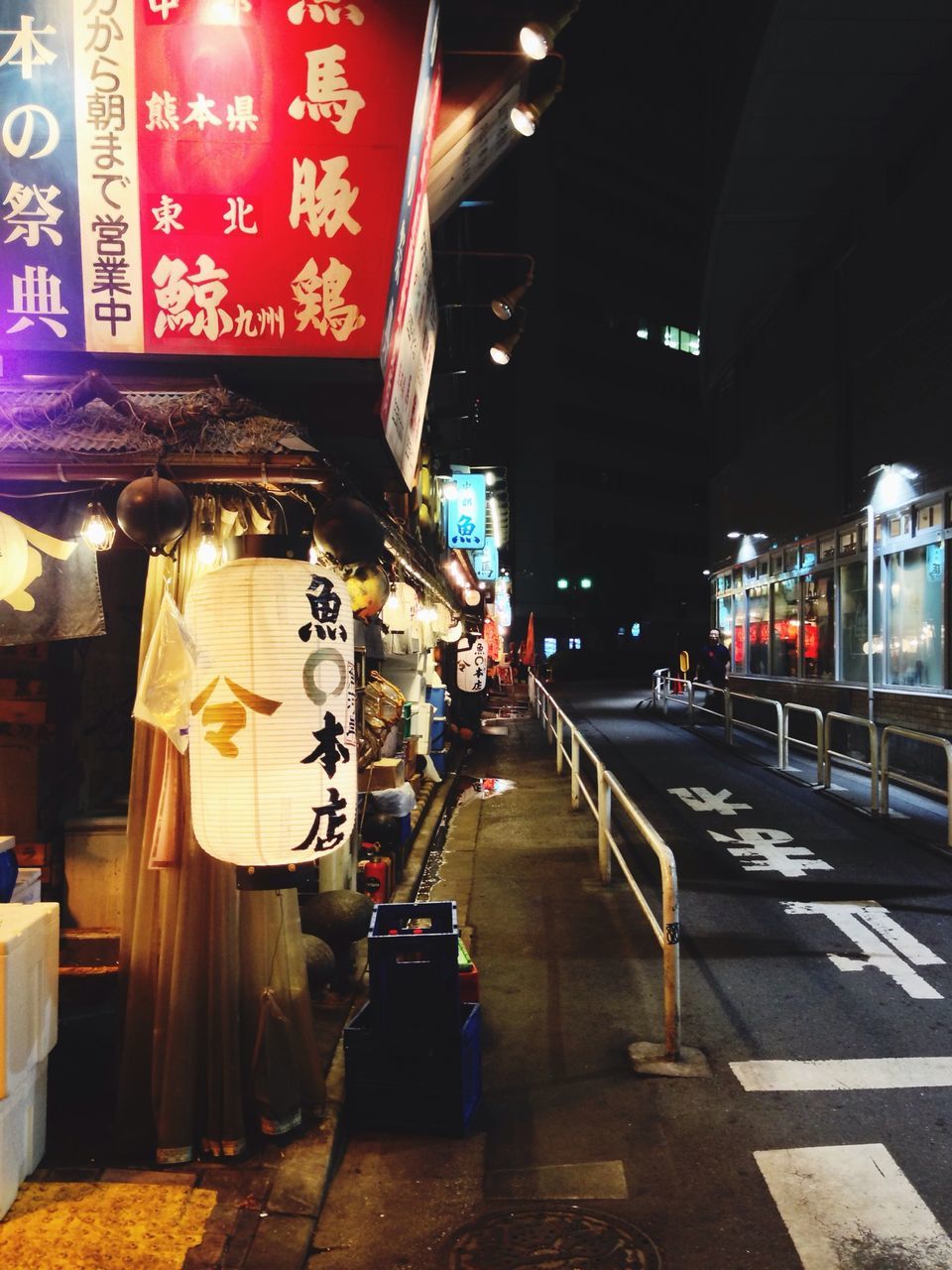 text, illuminated, western script, night, building exterior, architecture, built structure, street, non-western script, communication, city, store, information sign, incidental people, transportation, lighting equipment, city life, retail, sign, market