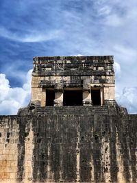 Low angle view of old building against sky