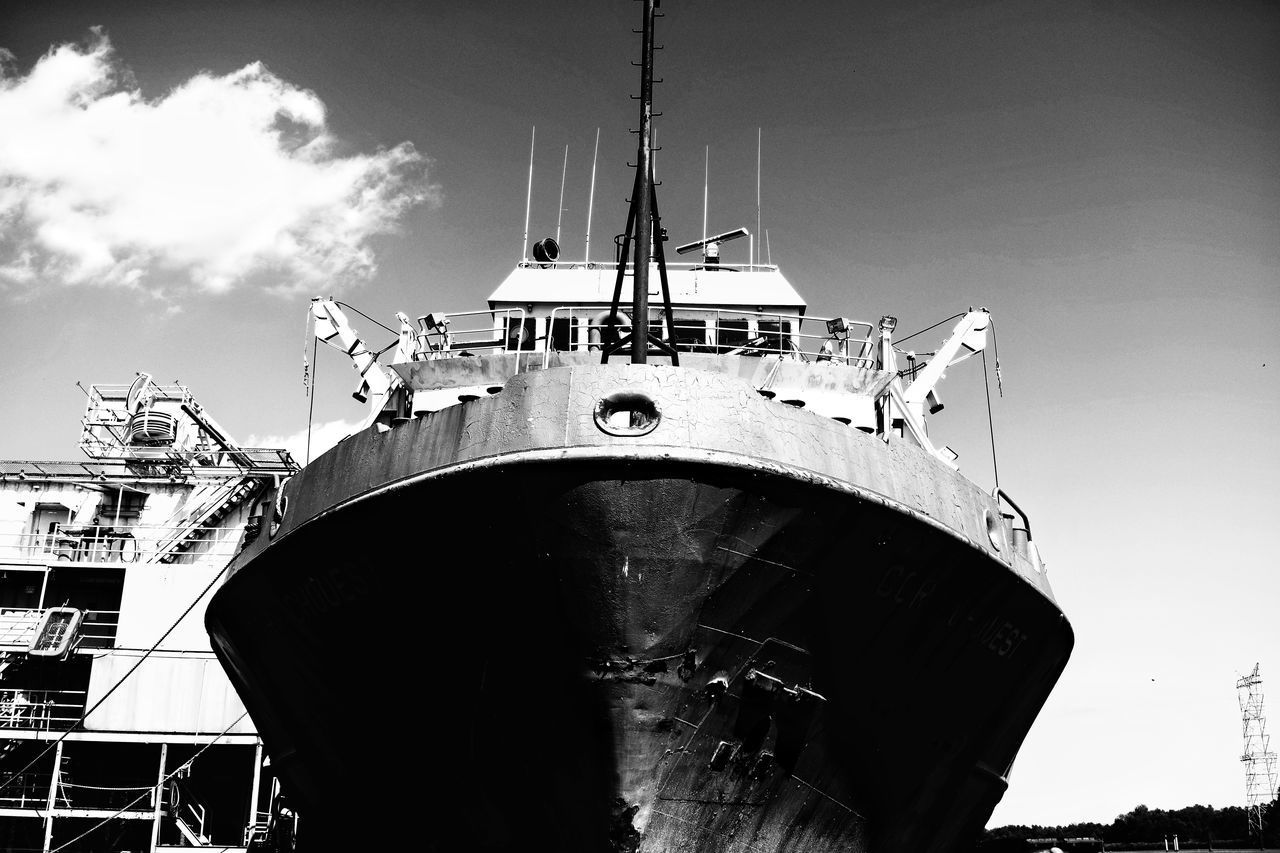 LOW ANGLE VIEW OF SHIP MOORED AT HARBOR