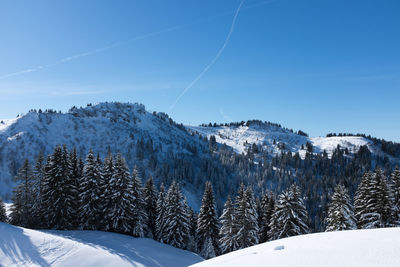 Idyllic shot of snowcapped mountains against sky