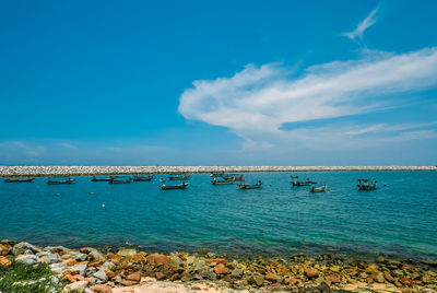 Scenic view of sea against blue sky