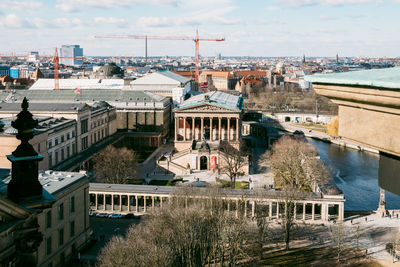 High angle view of river amidst buildings in city