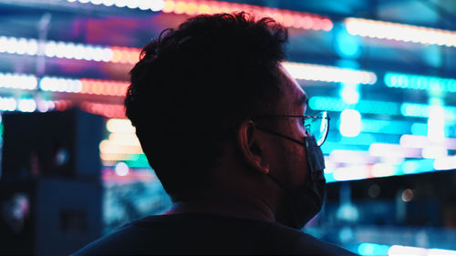 Man at an amusement park during the covid pandemic. 