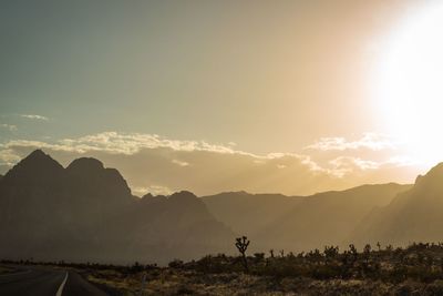 Scenic view of mountains against sky during sunset