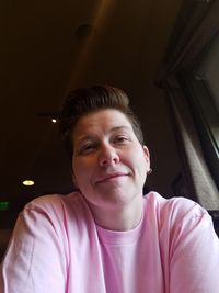 Close-up of woman sitting at restaurant