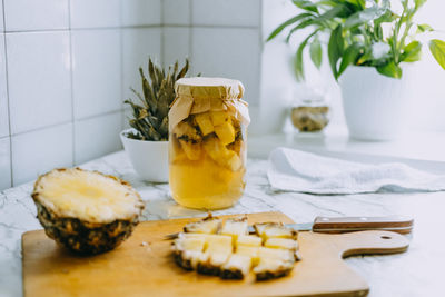 Fermented pineapple kombucha drink tepache. cooking process of homemade probiotic 