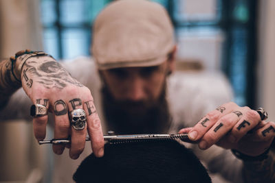 Hairdresser cutting hair