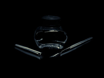 Close up of camera over black background