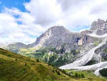 Scenic view of landscape and mountains against sky