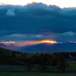 Scenic view of landscape against sky during sunset