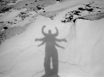 Shadow of man on wall