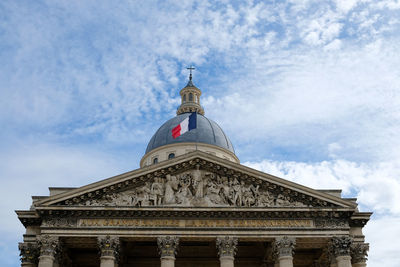 Low angle view of statue against sky