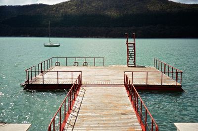 View of stairs in calm water