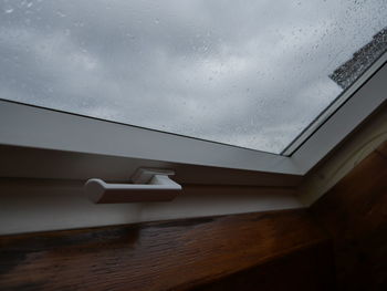 Low angle view of ceiling against sky