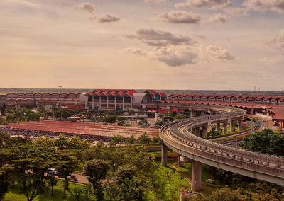 High angle view of bridge against sky in city
