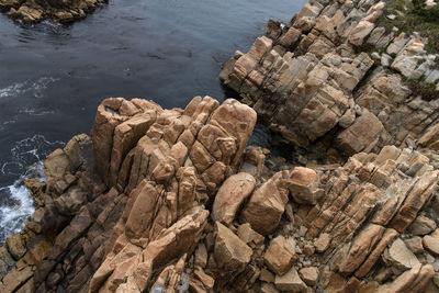 High angle view of rocks on shore