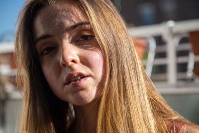 Close-up portrait of a young woman