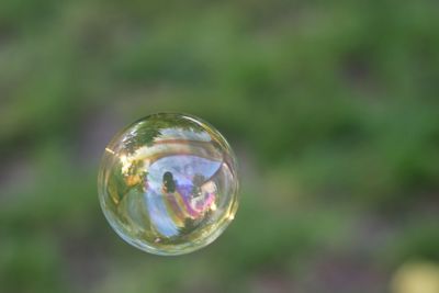 Close-up of bubble in mid-air