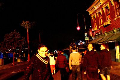 Silhouette of woman standing at night