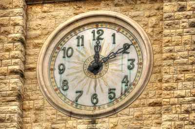 Close-up of clock on wall