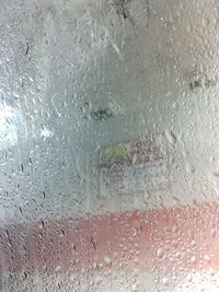 Close-up of water drops on glass window