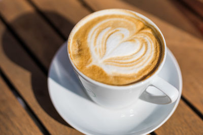 Close-up of cappuccino on table