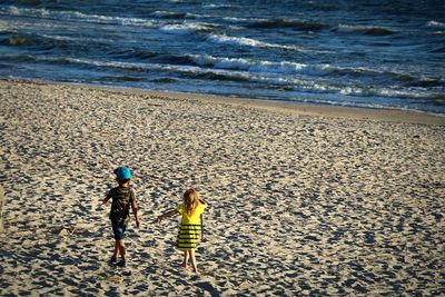 Women walking on beach