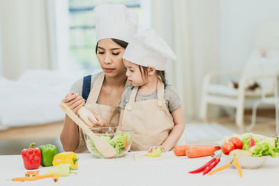 Young woman preparing food